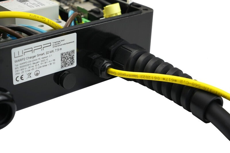WARP Charger showing the cable inlets for Ethernet andtype 2 charging cable
