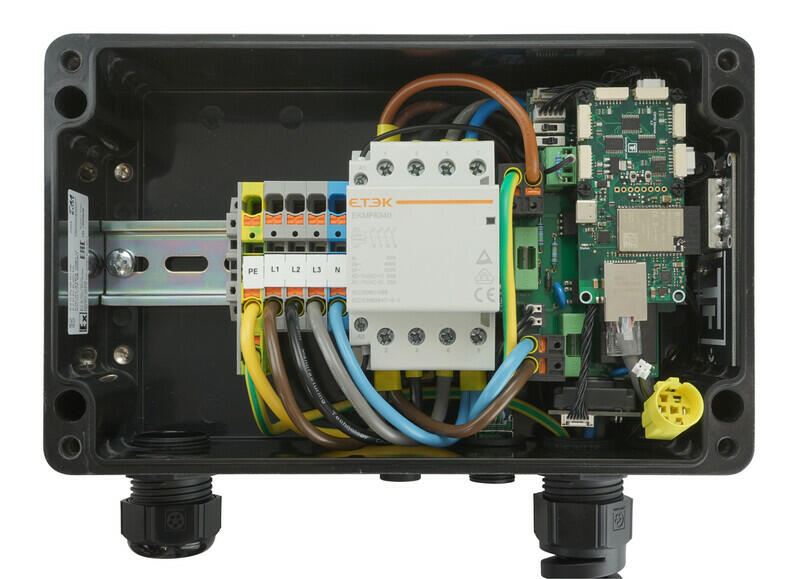 WARP Charger PRO interior showing the electronics, switches and energy meter